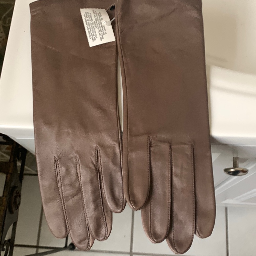 Tan leather gloves by Fownes